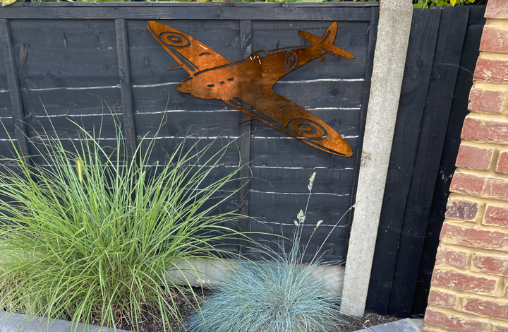 rusty spitfire aeroplane garden art